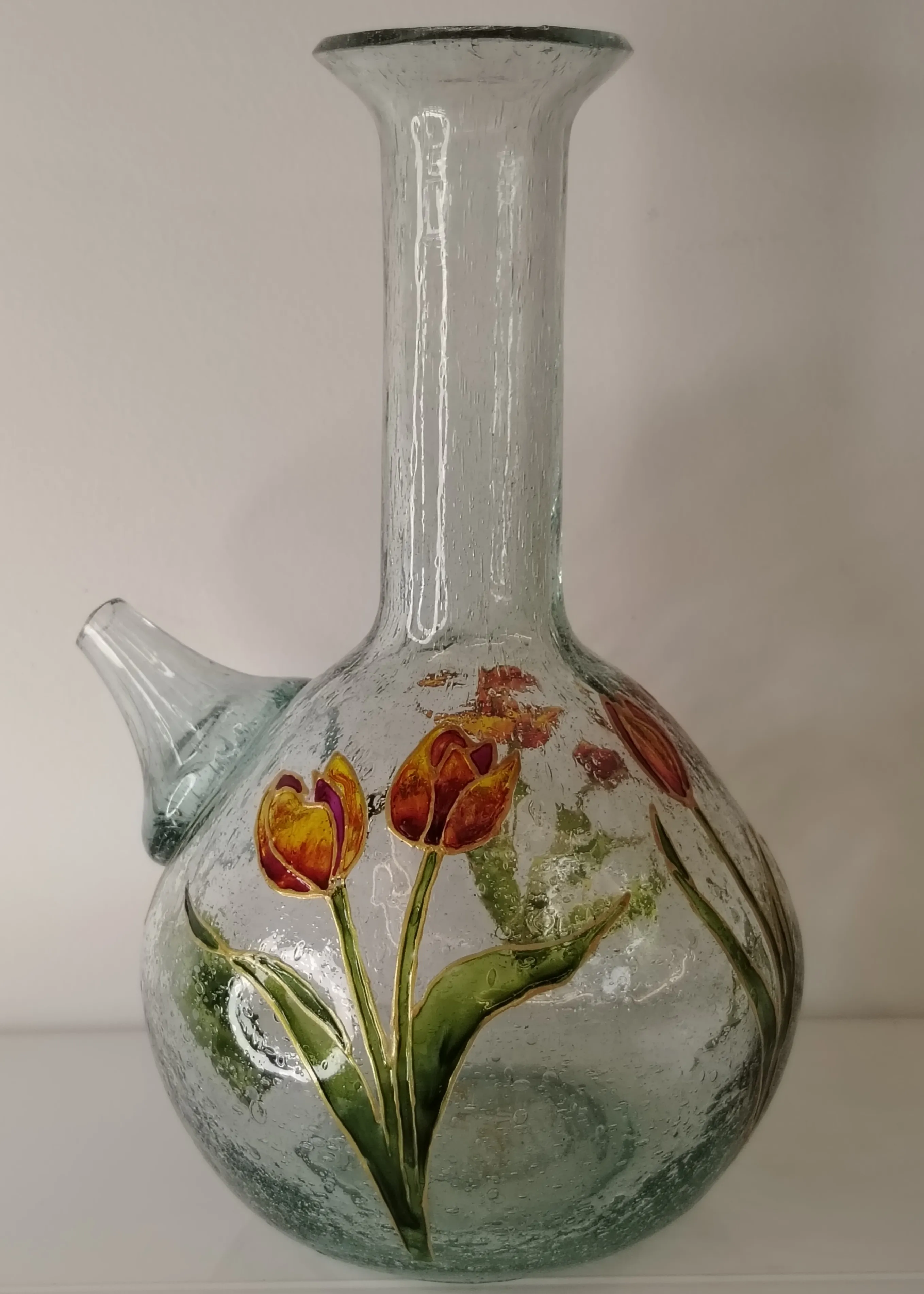 Hand-painted Lebanese glass jug with a vibrant pink hydrangea bouquet outlined in gold vitrail