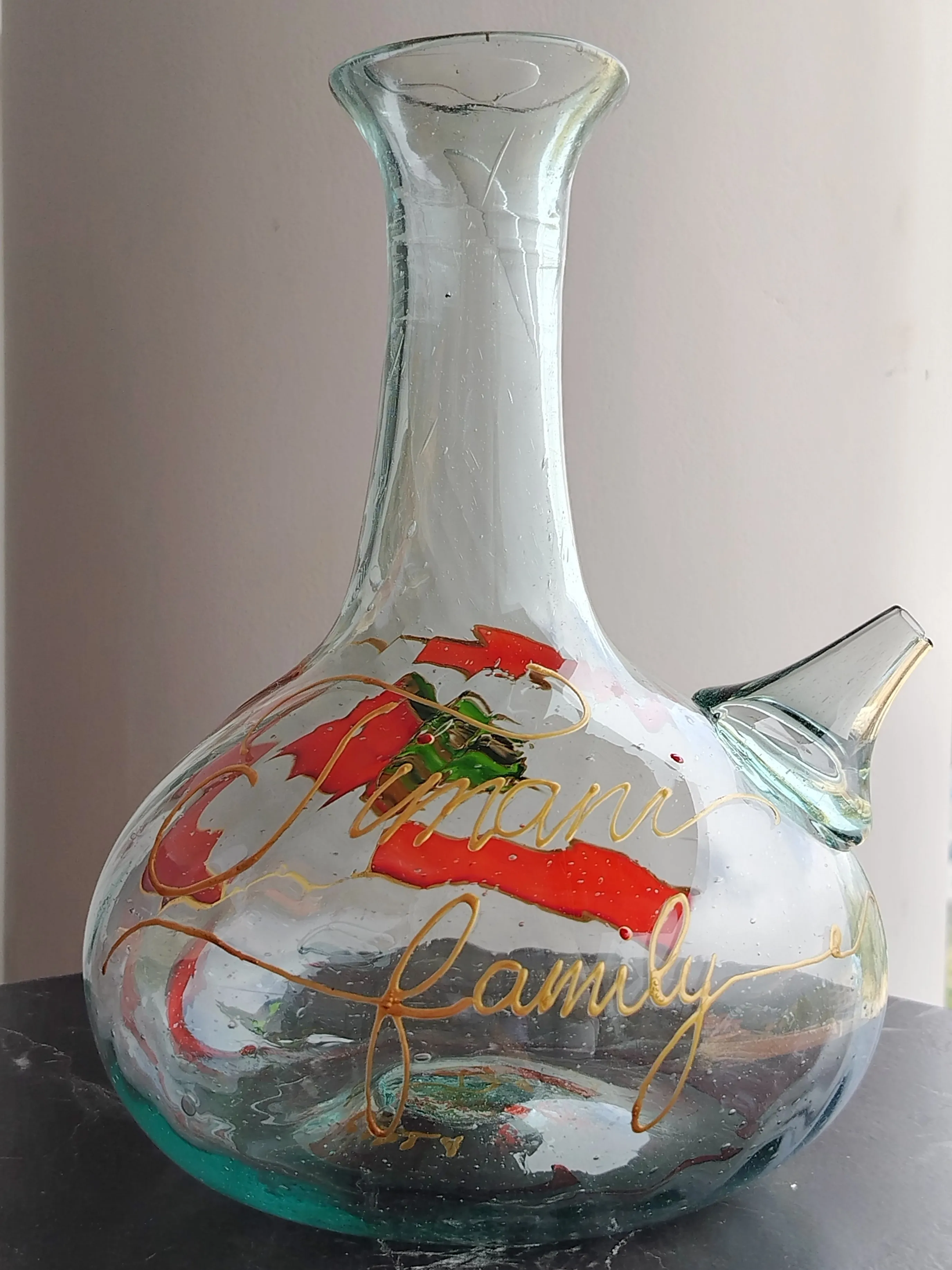 Custom hand-painted glass jug commissioned for the Simani family